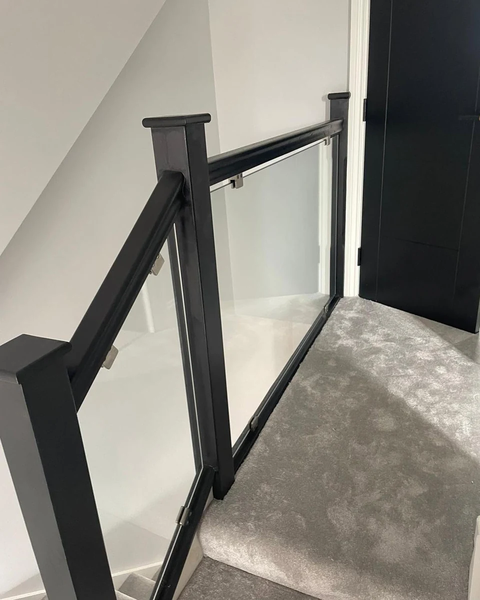 staircase-glass-balustrade-black-frame-door-landing-sevenoaks-sevenoaks-glass-balustrades Staircase glass balustrade with black frame beside landing door, Sevenoaks Glass Balustrades